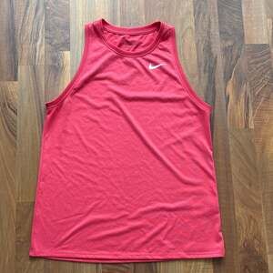 Nike Men’s Pink Sleeveless Athletic Tank with White Swoosh